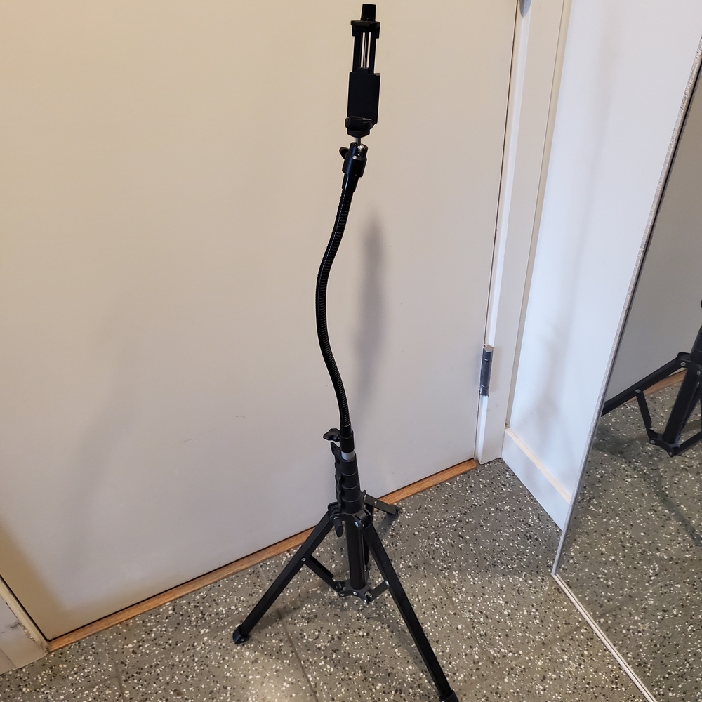Adjustable Black Tripod Stand for Cameras and Phones